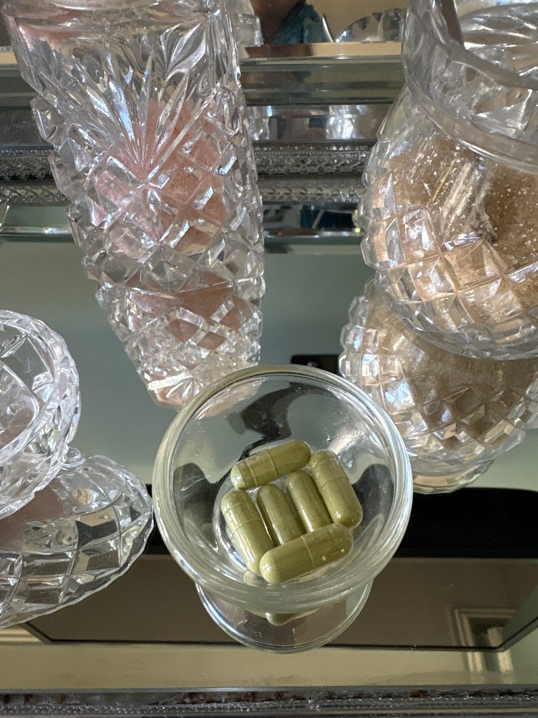 Moringa Capsules placed on a counter in a customer-submitted photo.